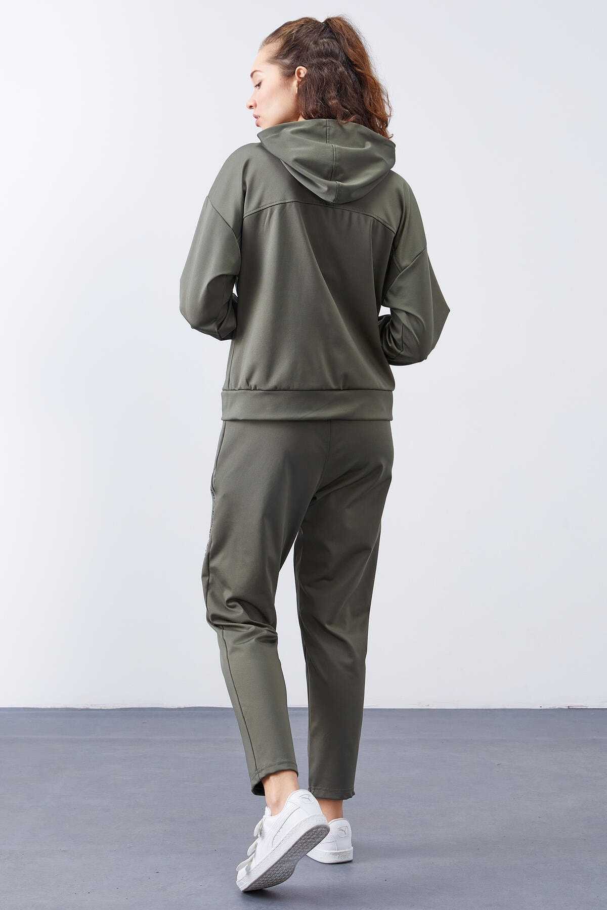 ست لباس ورزشی پارچه ای غواصی زنانه کلاهدار چاغلا با جزئیات جیب مخفی - 95306