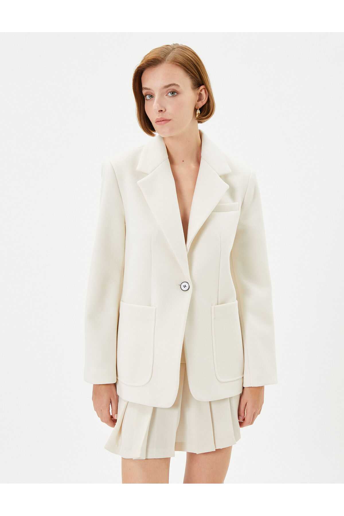 جیب تک دکمه ژاکت بلیزر با جزئیات