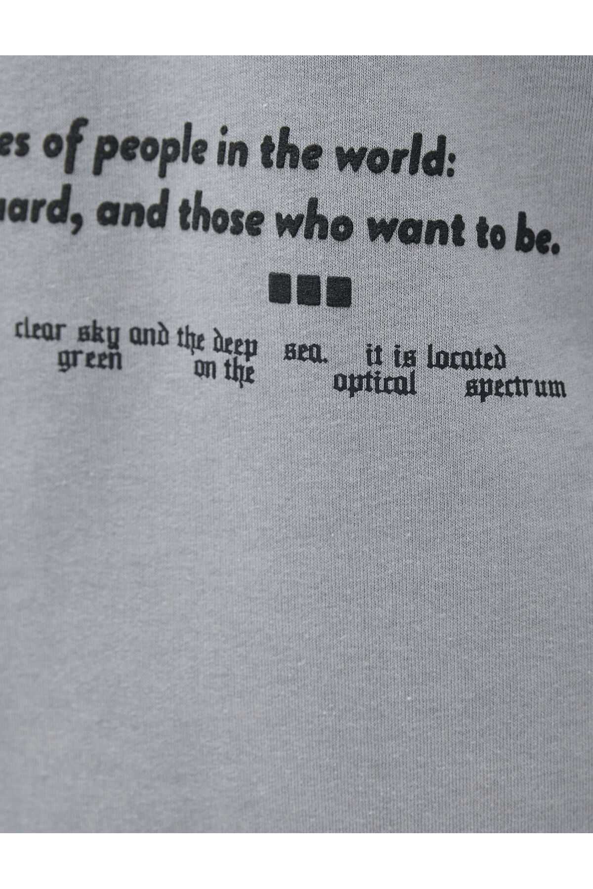 بلوز آستین بلند کلاه دار با چاپ پشت