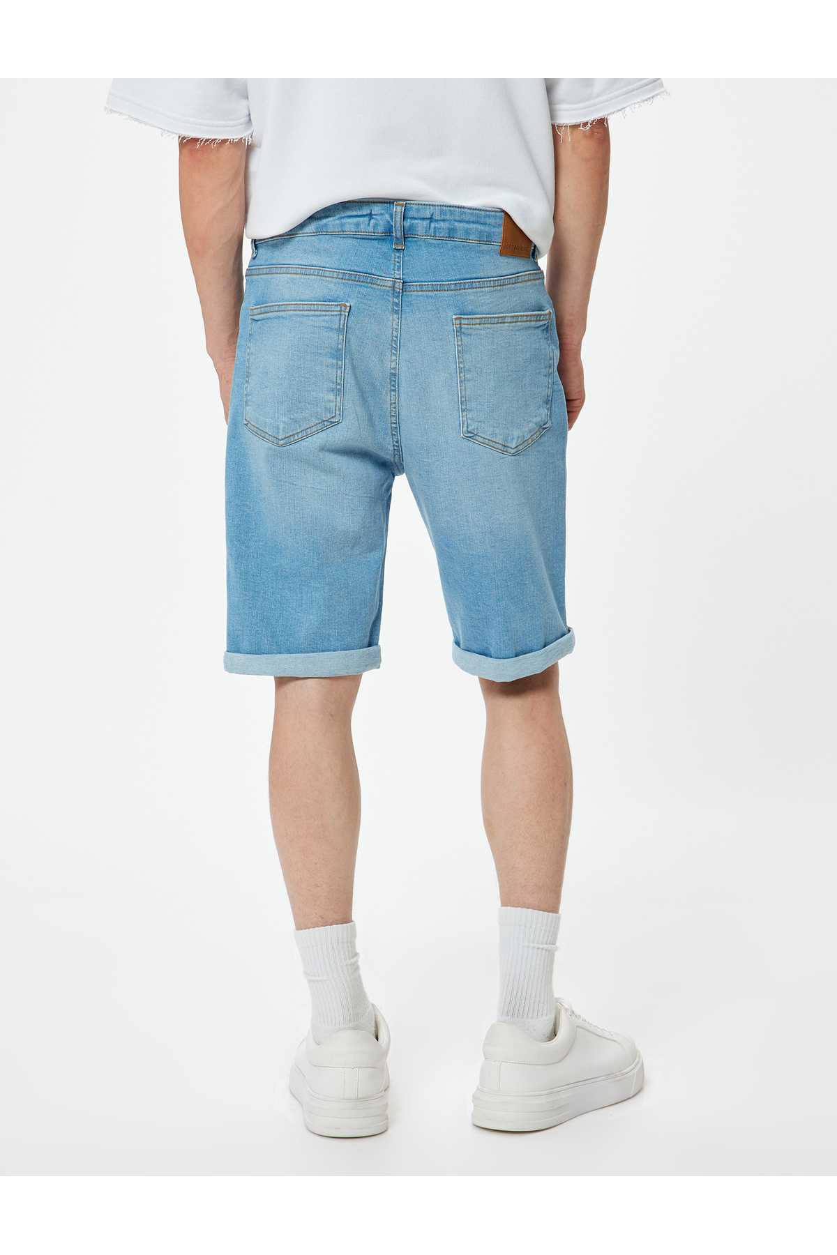 شلوارک جین باریک با دکمه کاف تاشو برمودا