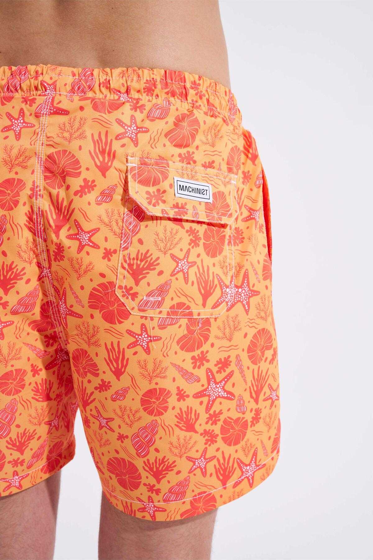 شلوار شنا مردانه با چاپ صدف زرد