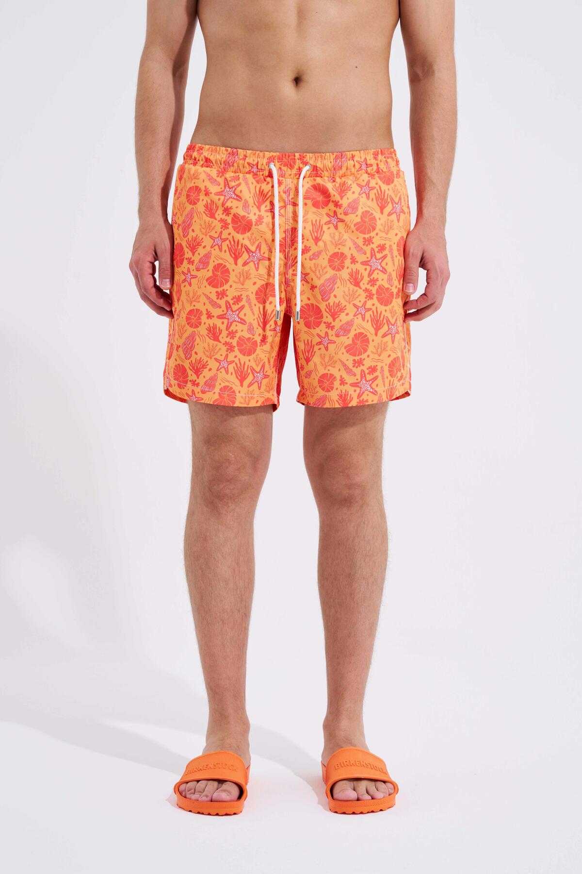 شلوار شنا مردانه با چاپ صدف زرد