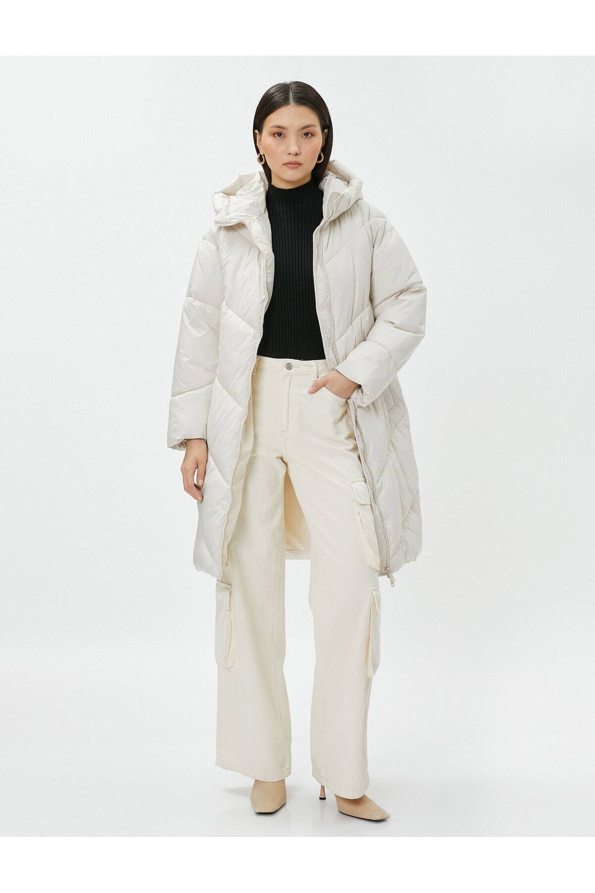 ژاکت پفی بلند با جیب زیپ دار