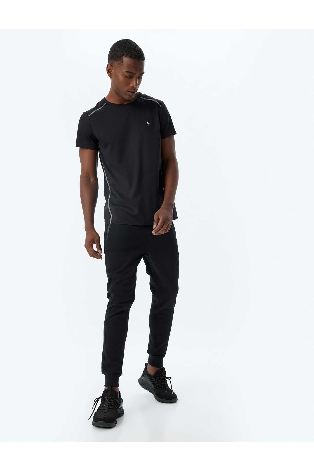 شلوار ورزشی اسپرت دوخت توری دور کمر ترکیبی پنبه ای با جزئیات