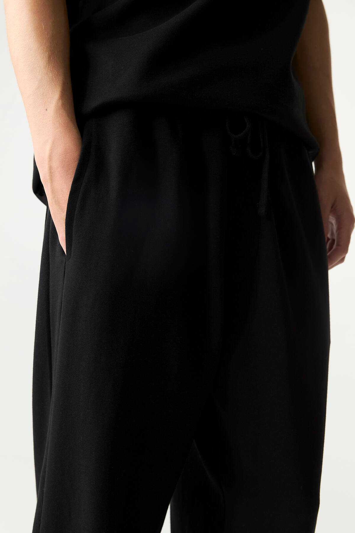 شلوار گرمکن پارچه ای اینترلاک